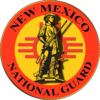 Emblem of the New Mexico National Guard. Red and yellow with the National Guard Minuteman over the New Mexico state flag and Zia symbol.