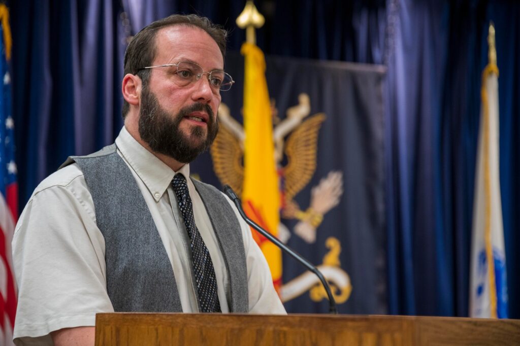 Rabbi Neal Amswych offers a prayer.